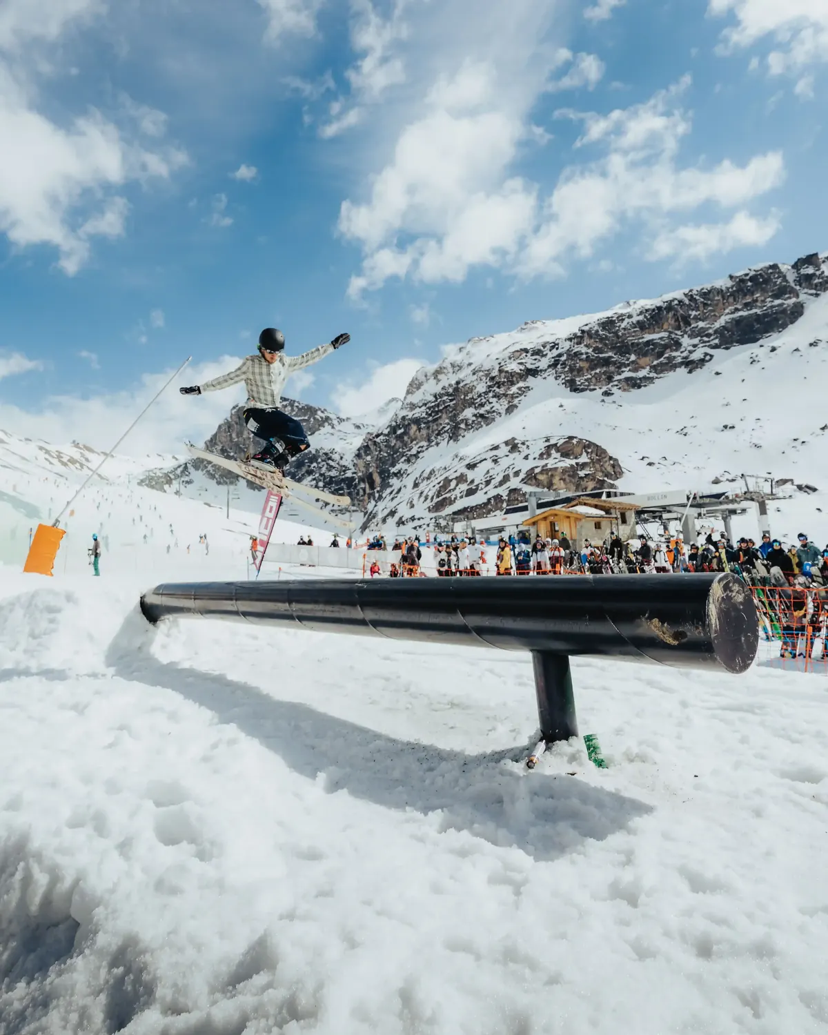 Skier setting up for a rail feature in the snowpark